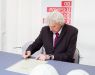 The head of WCWI Grzegorz Michalski signs the construction act
