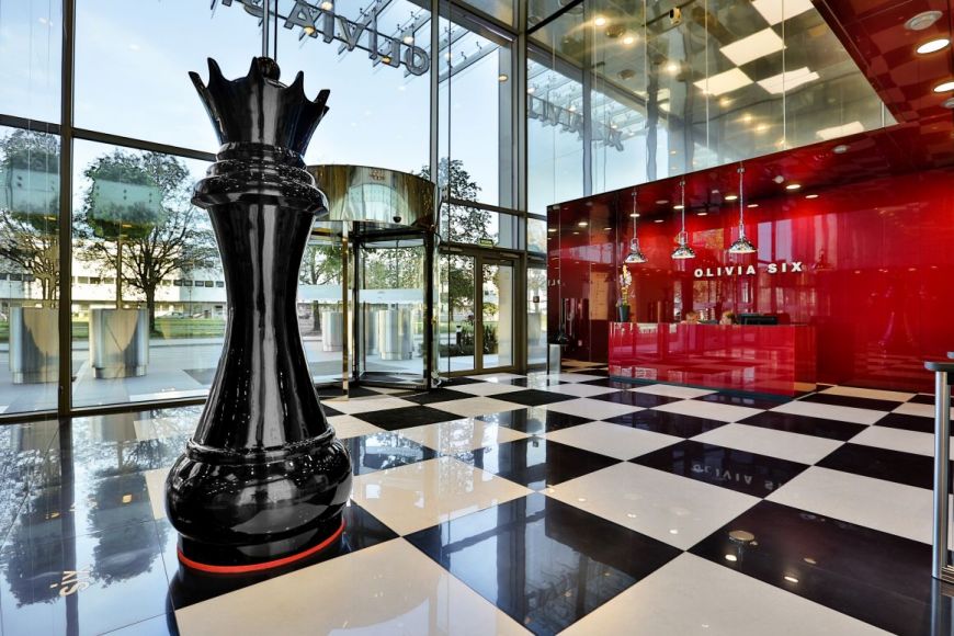  - Main hall in the form of a large chessboard made from black and milky stone